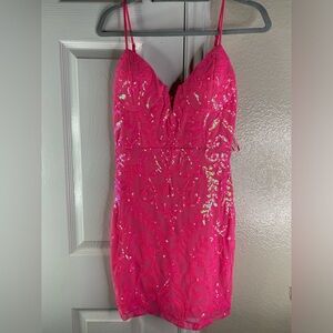 Hot pink sequins dress.